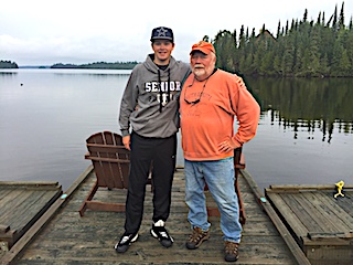 Grandfather Lloyd and Grandson Cole Fishing at Fireside Lodge in Canada  